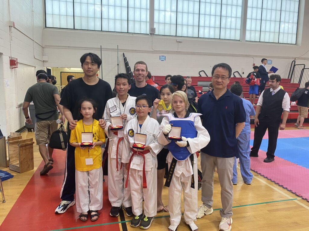 Jae H. Kim Cambridge Sparring Team with their medals